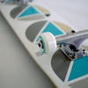 repeat complete skateboard white close up polished trucks and wheels